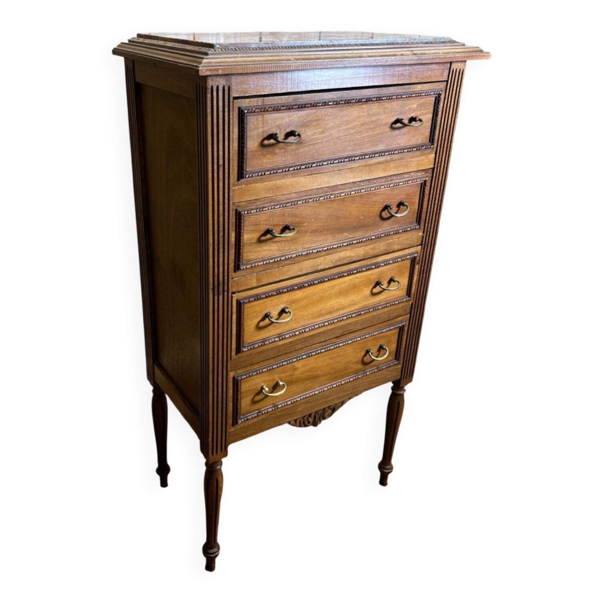 Louis XVI style molded and carved walnut chest of drawers