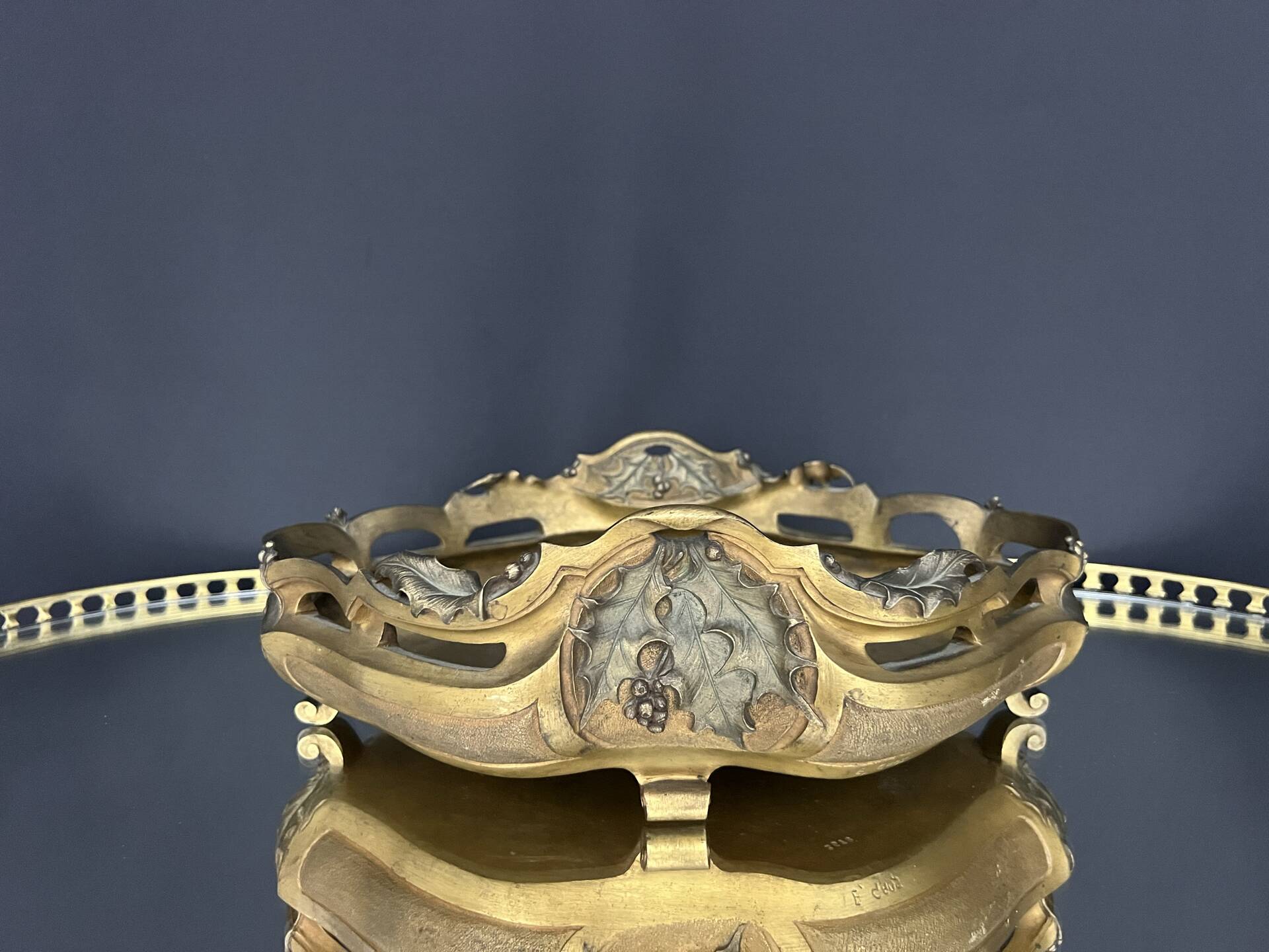 Art Nouveau jardinière in gilded bronze with holly decoration, signed E. Gros.