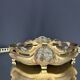 Art Nouveau jardinière in gilded bronze with holly decoration, signed E. Gros.