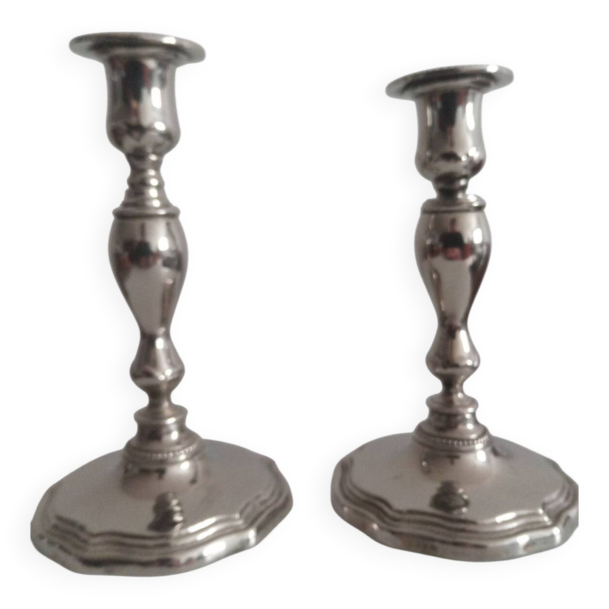 Pair of silver-plated metal candlesticks