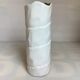 Vase with patterns of rolled paper leaves