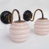 Swan neck wall lights in brass and glass