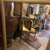 Giled and black fireplace mirror