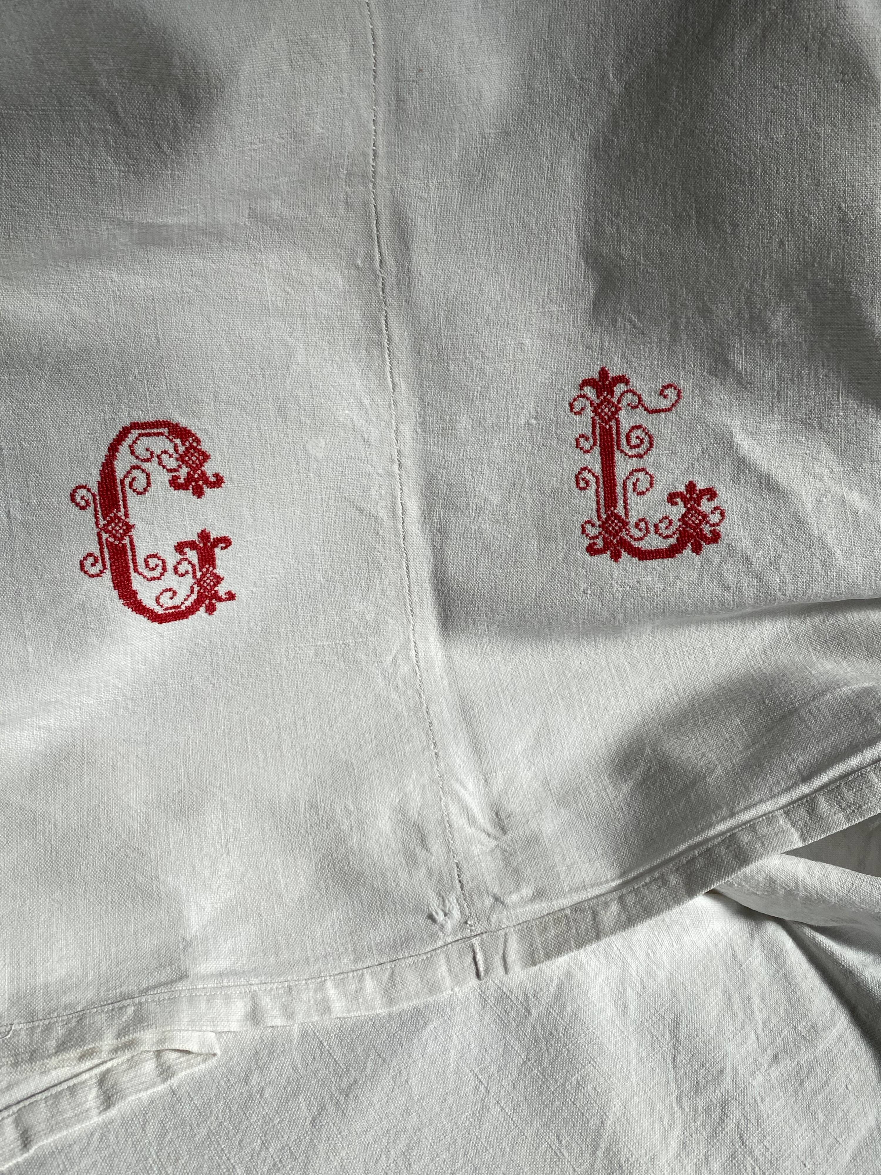 Old sheet with monogram