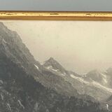 Photo in black and white mountain lake in golden frame