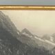 Photo in black and white mountain lake in golden frame