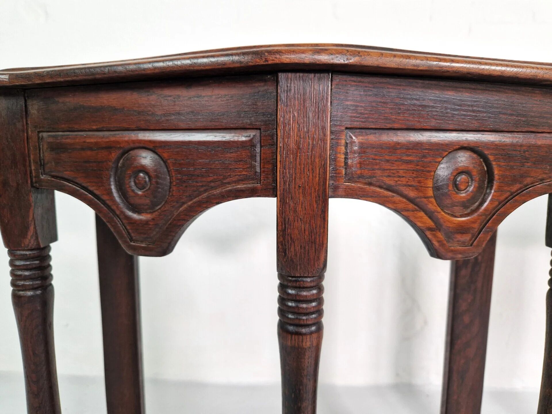Pair of English 1920s carved oak sidetables