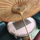 Asian paper and rattan umbrella