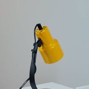 A pair of well-designed minimalist bedside lamps.