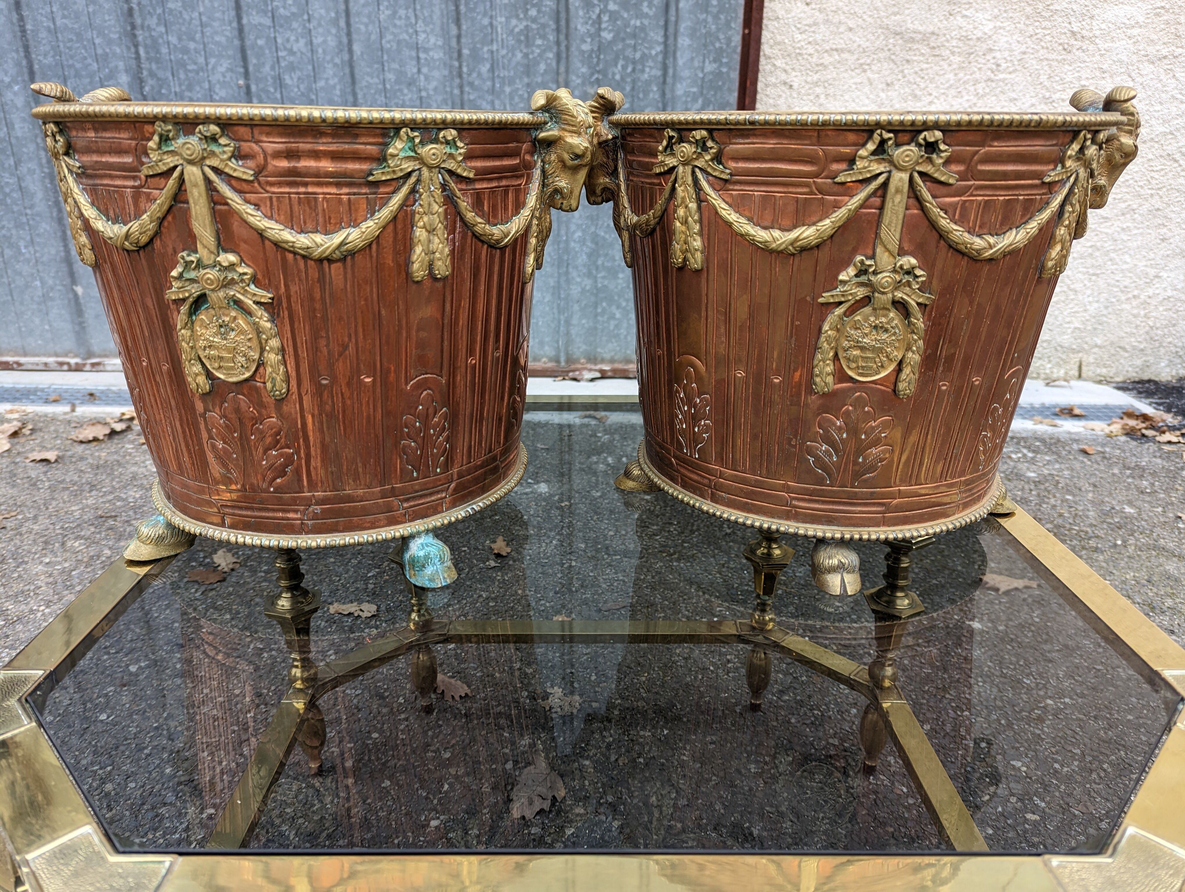 Pair of brass and bronze planters rams' heads 1890
