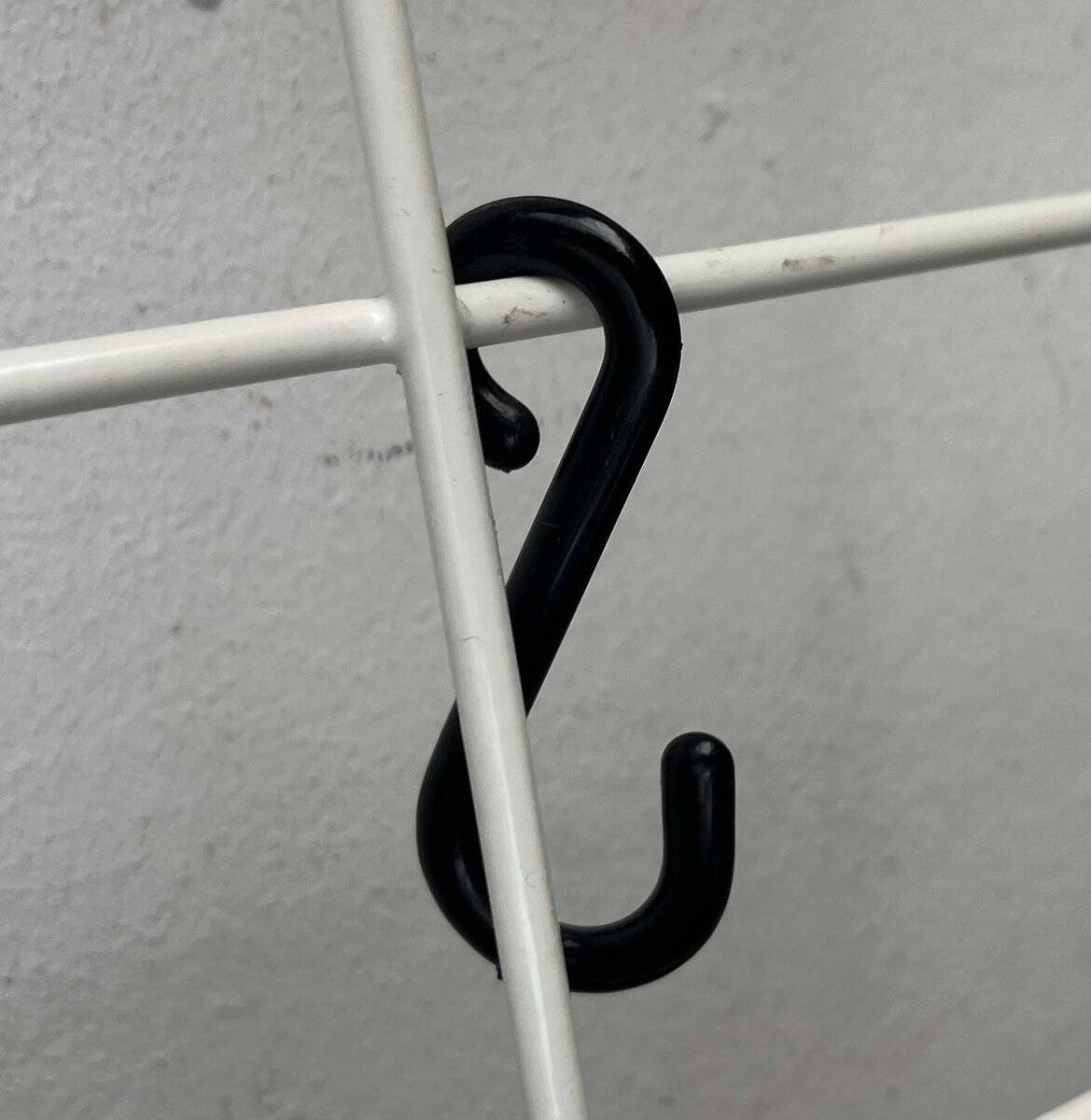 Minimalist white German mid-century coat rack with strings from the 1960s.