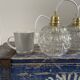 Set of two vintage electrified glass pendant lamps