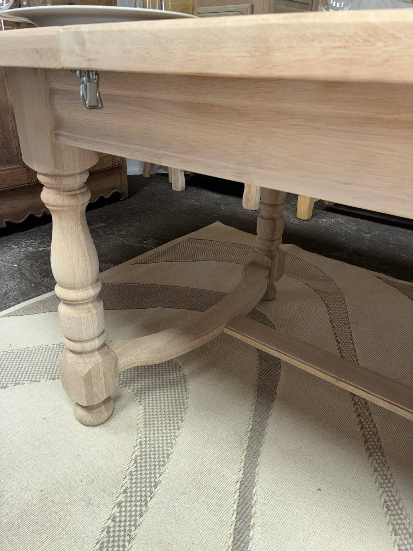 Solid oak farmhouse table with extensions.