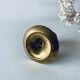 Golden brass candle holder