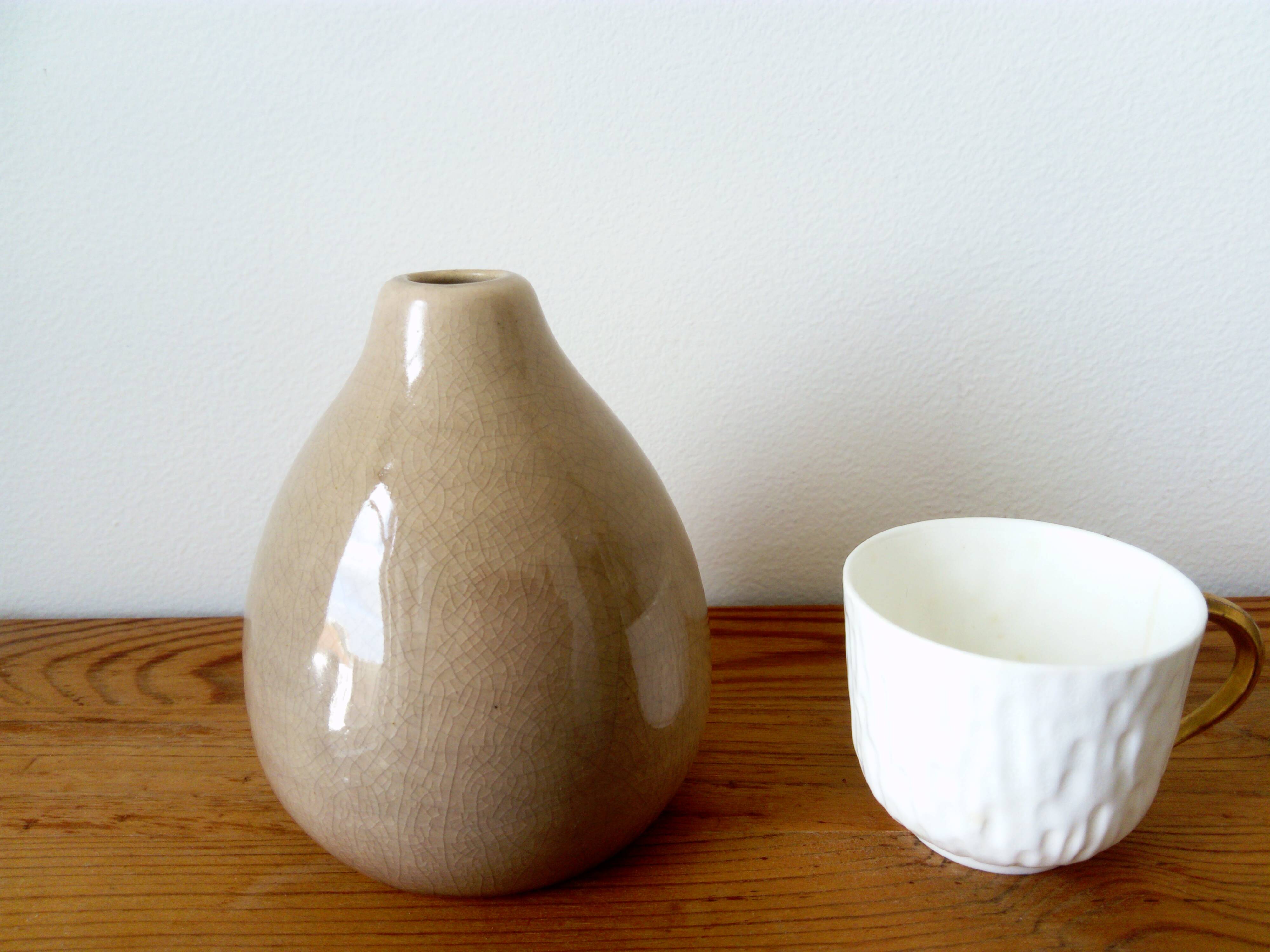 beige vase in finely cracked glazed ceramic