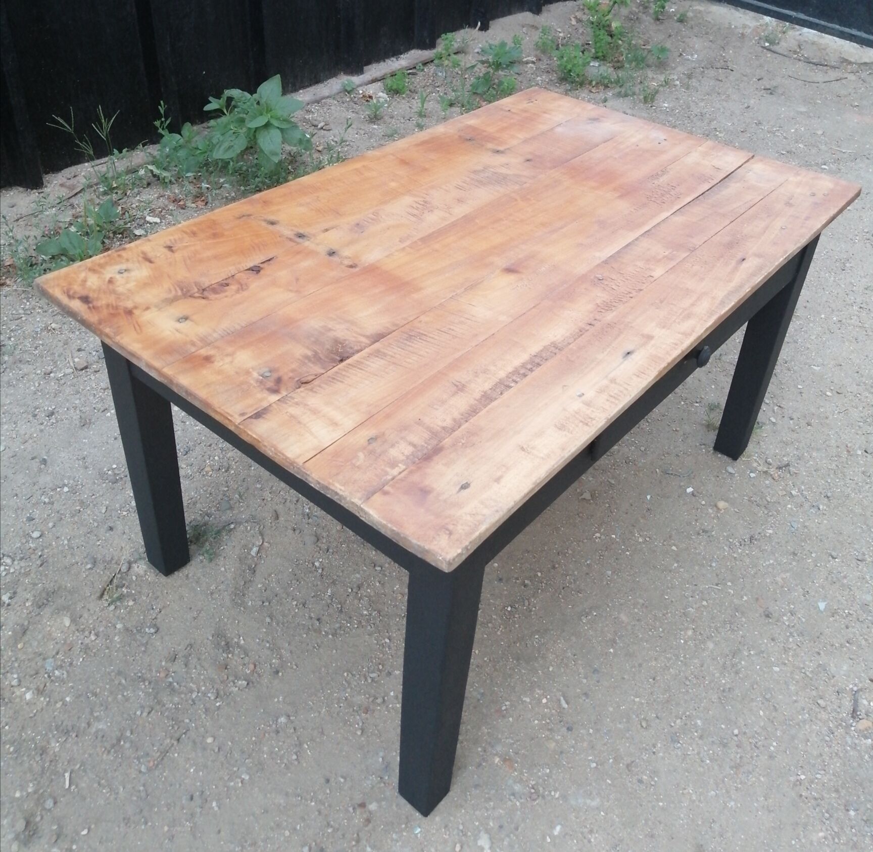 Wooden coffee table with a drawer
