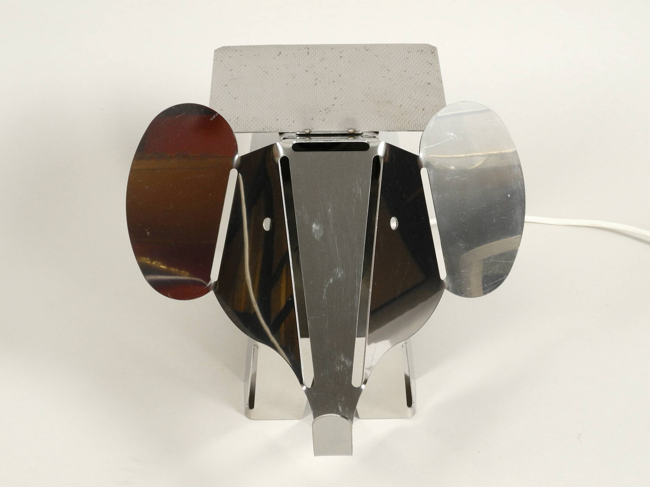 80s heavy metal chrome elephant floor lamp as side table Postmodern design