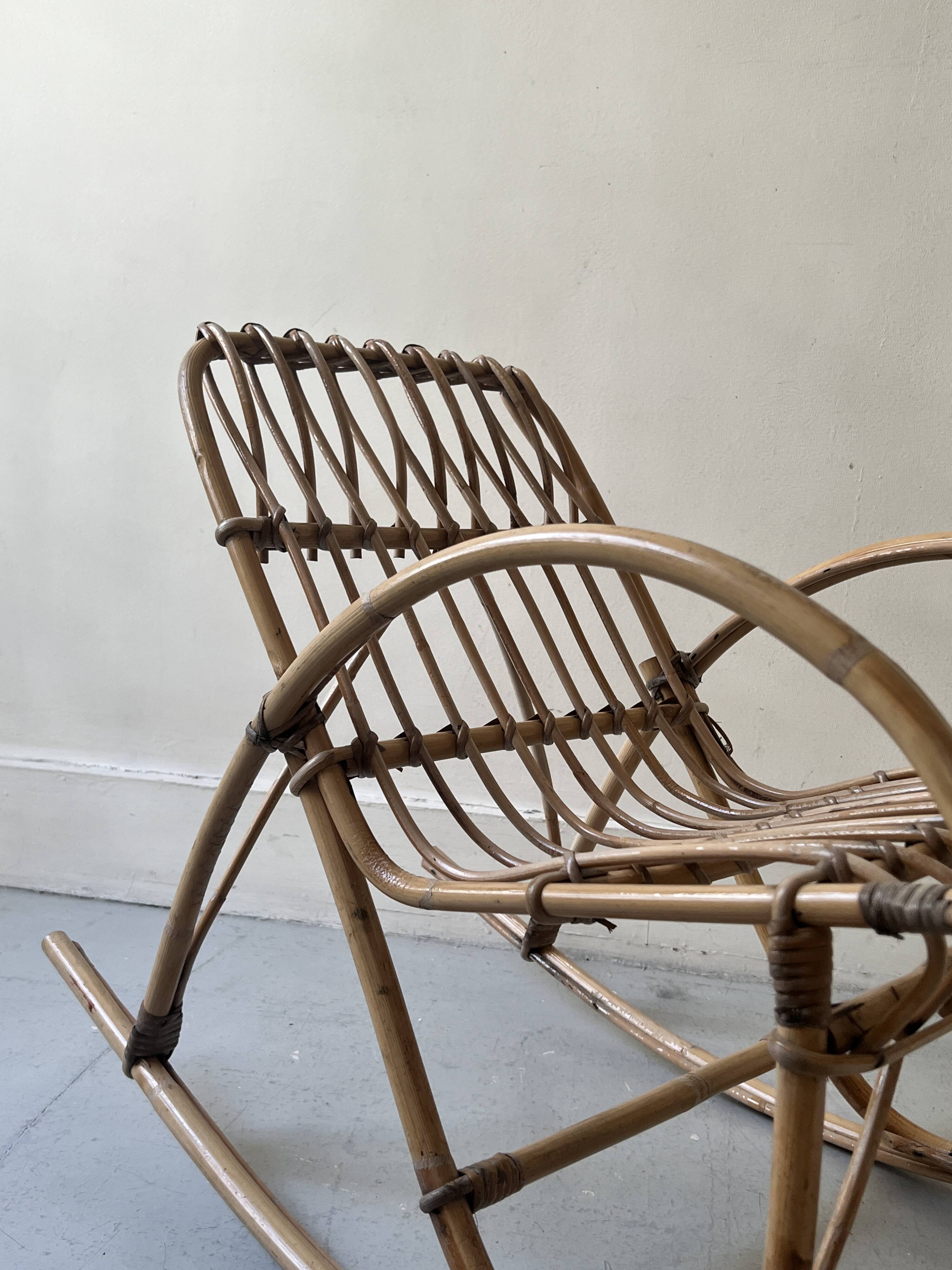 Child's rocking chair in rattan/bamboo, France 1950.