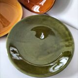 Set of green and amber enamelled plates