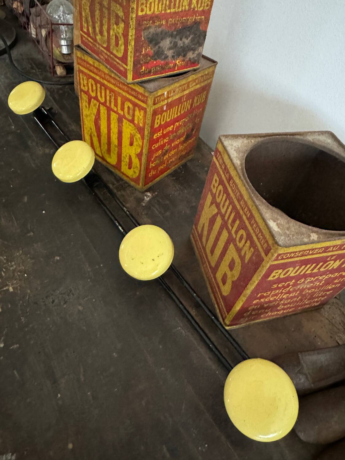 Wall coat rack with 4 vintage yellow metal hooks