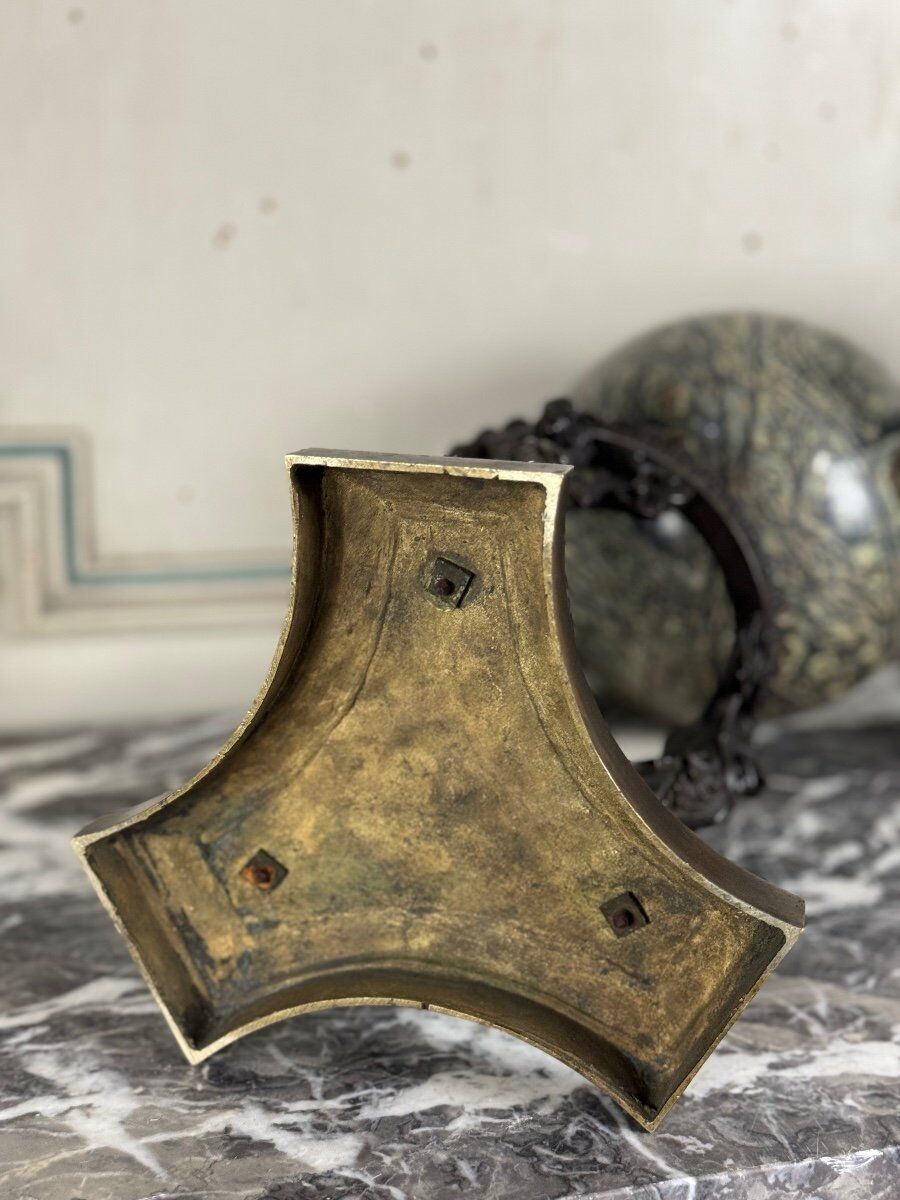 Pair of marble spheres on bronze tripods, 19th century