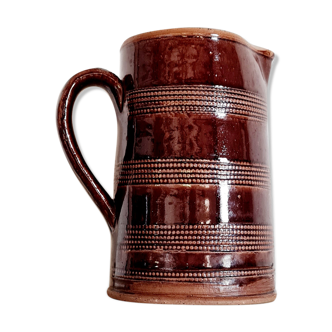Pitcher in glazed brown terracotta