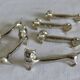 6 metal knife holders, cat theme.