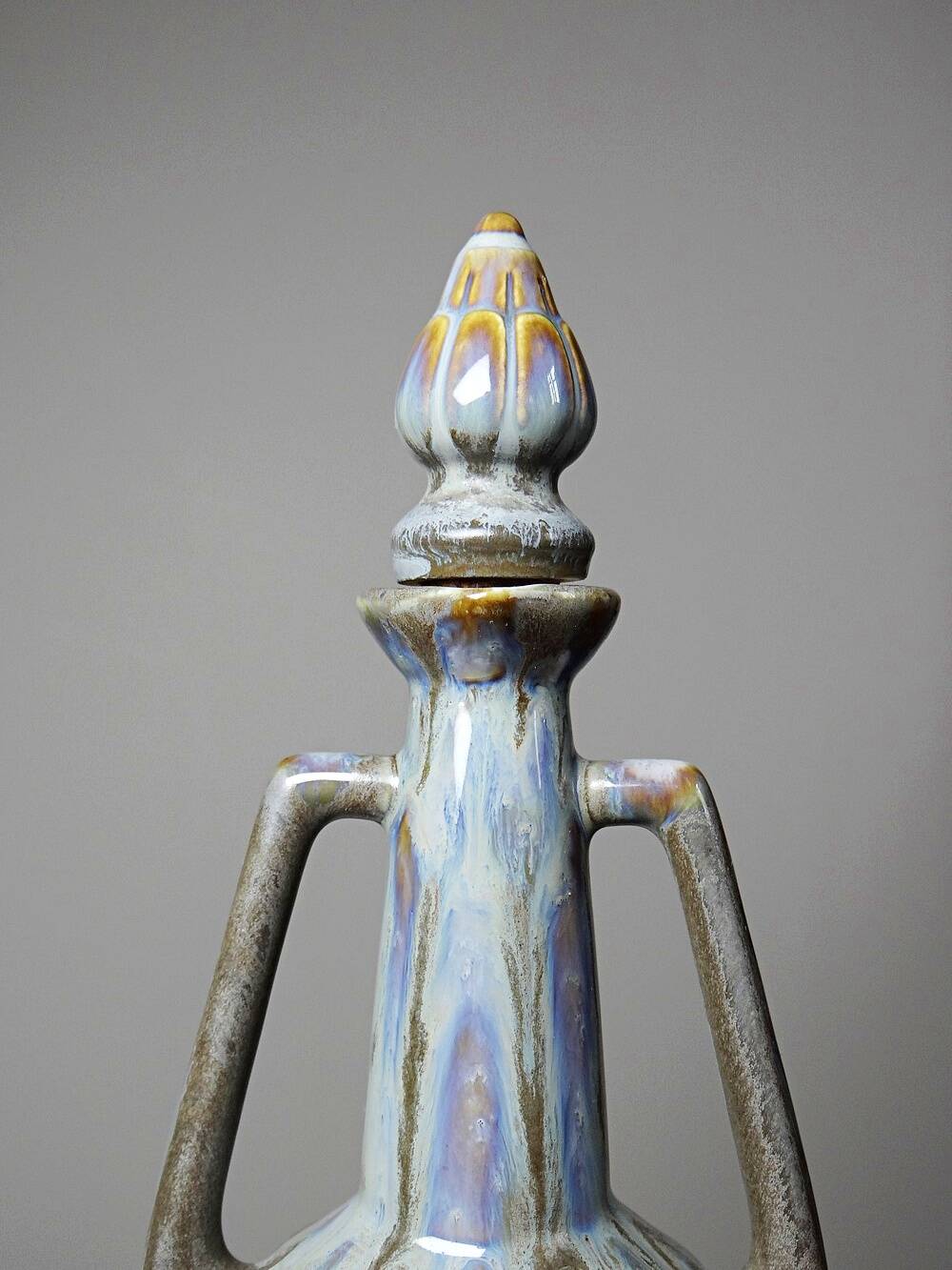 Vintage stoneware bottle with flamed glaze, France 1950-1970.