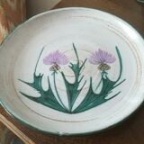 Round dish with thistles