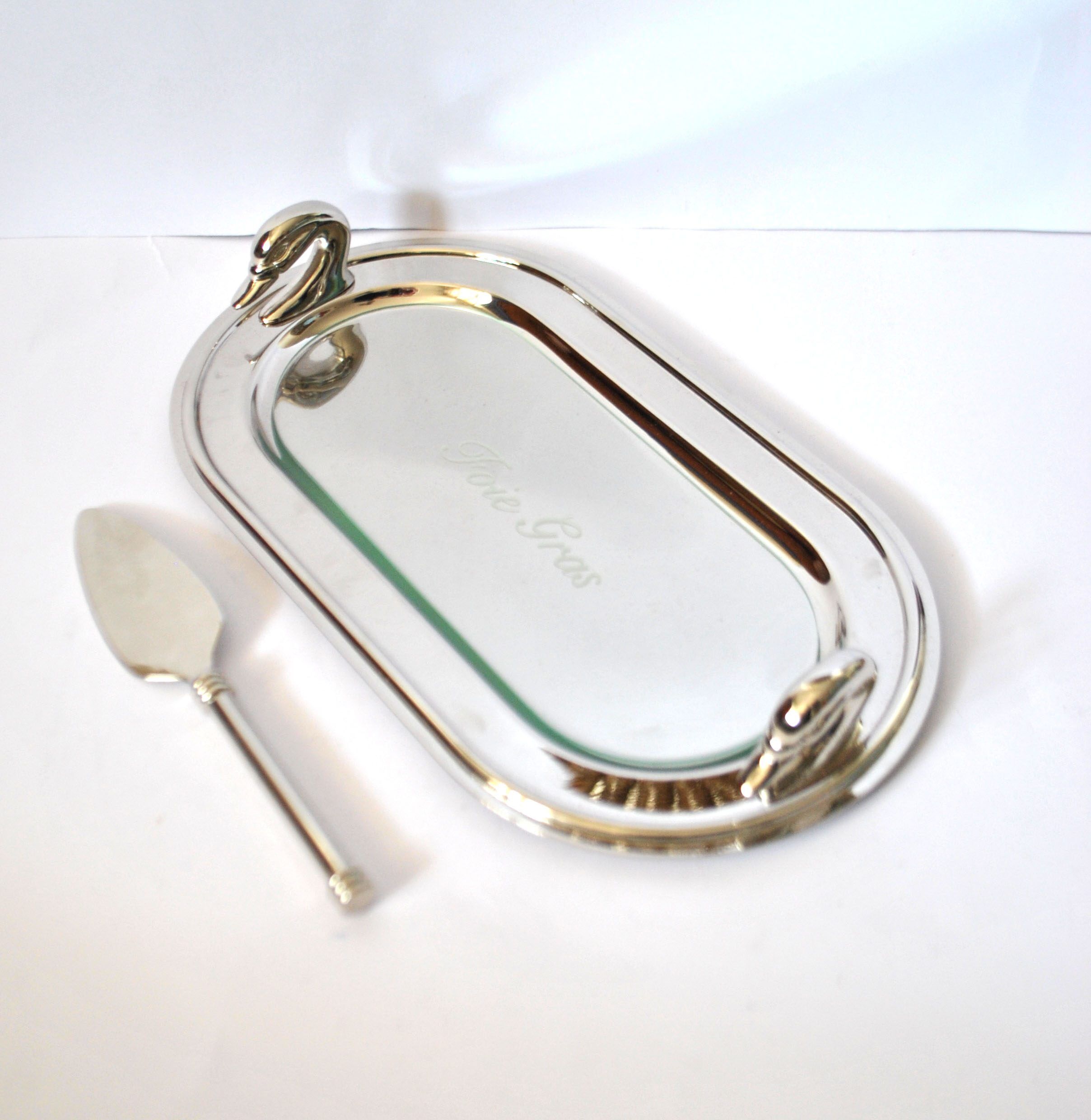 Vintage silver-plated foie gras platter with goose head decoration and serving spatula.
