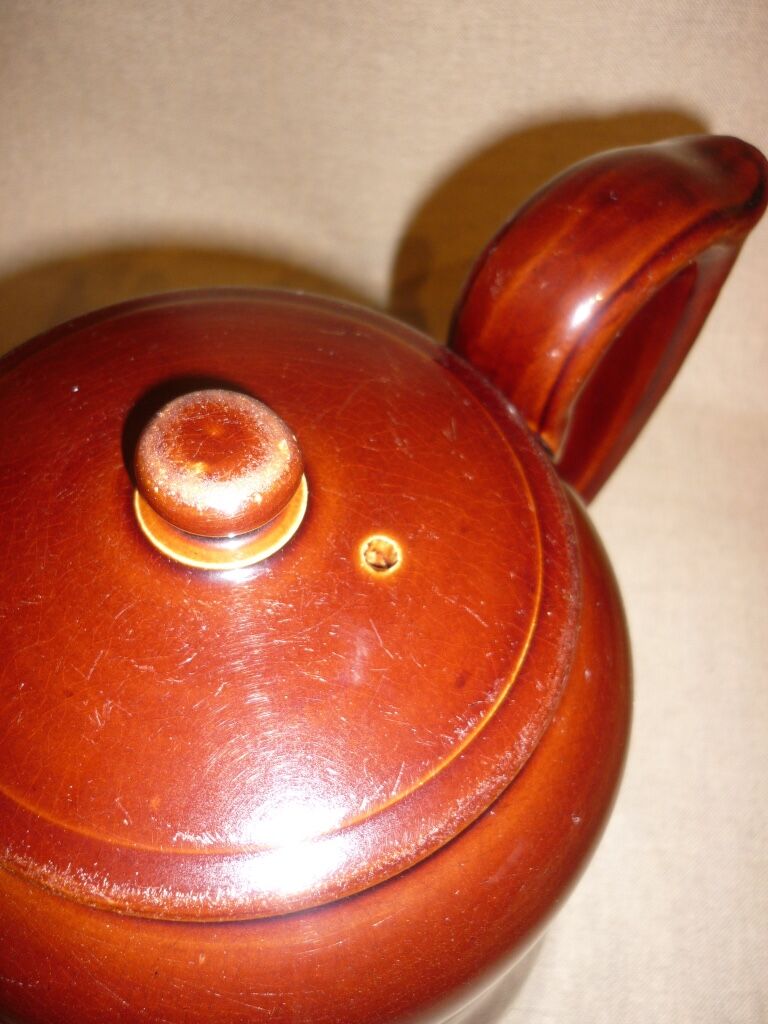 Very large brown ceramic coffee maker