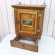 Vintage folk art mirror wall storage unit