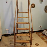 Old wooden stepladder with bodyguards