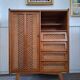 Vintage rattan cabinet with compass feet, old wicker chest of drawers