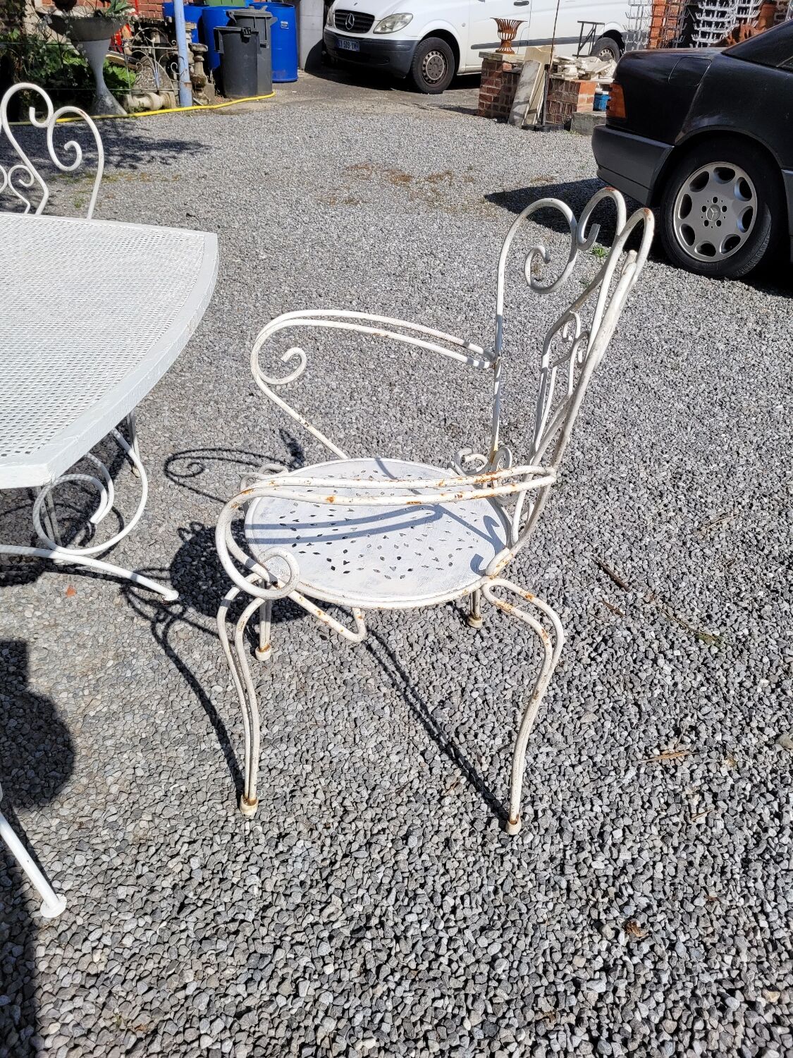 Old wrought iron garden furniture, table + 2 armchairs + 2 chairs