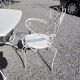 Old wrought iron garden furniture, table + 2 armchairs + 2 chairs