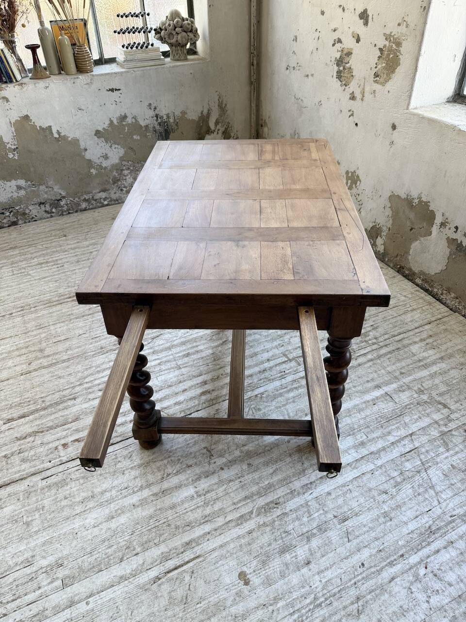 Paneled walnut desk with turned legs, 1900