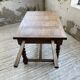 Paneled walnut desk with turned legs, 1900