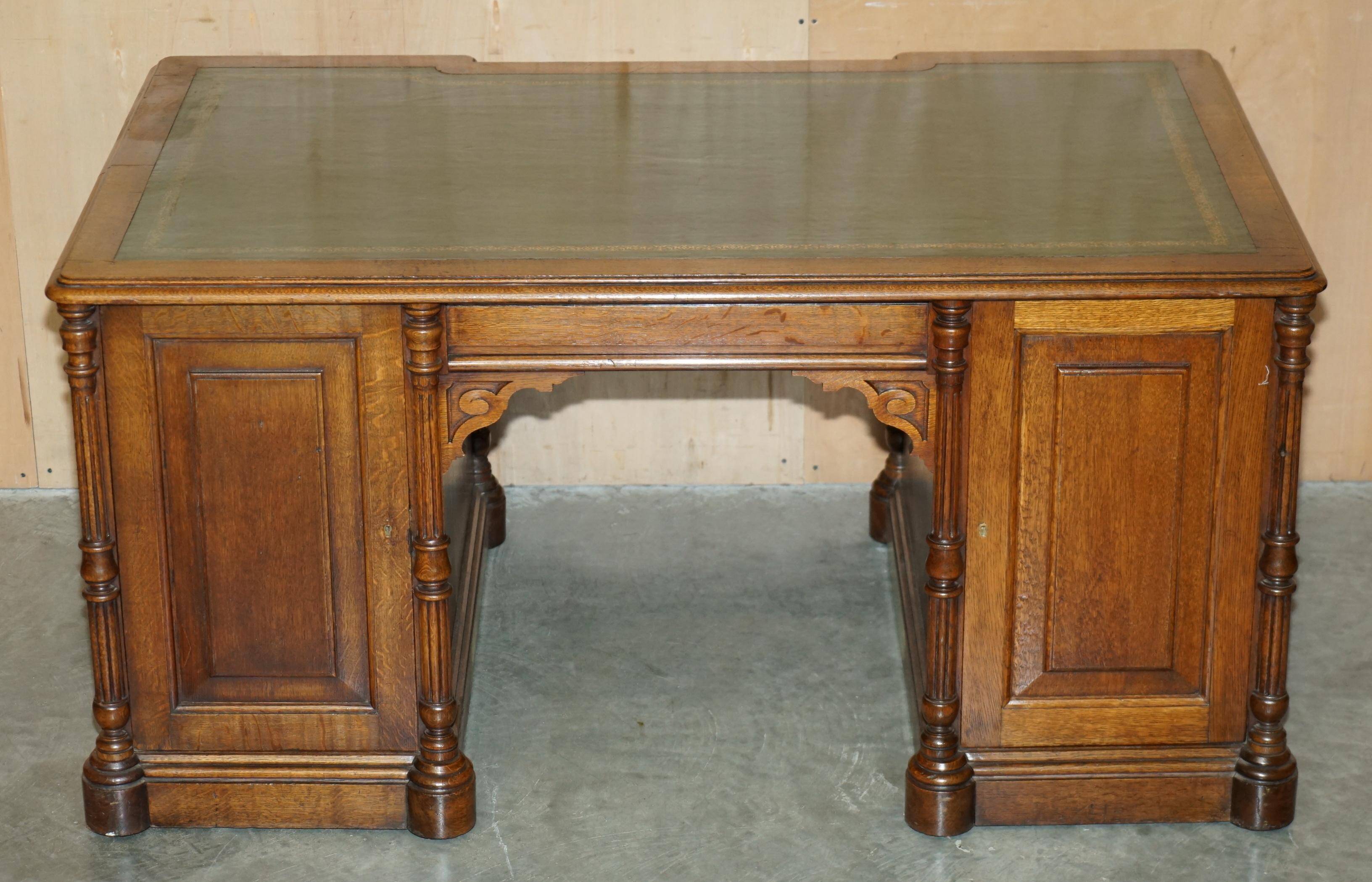 Antique double-sided desk C Hindley & Son in oak and leather
