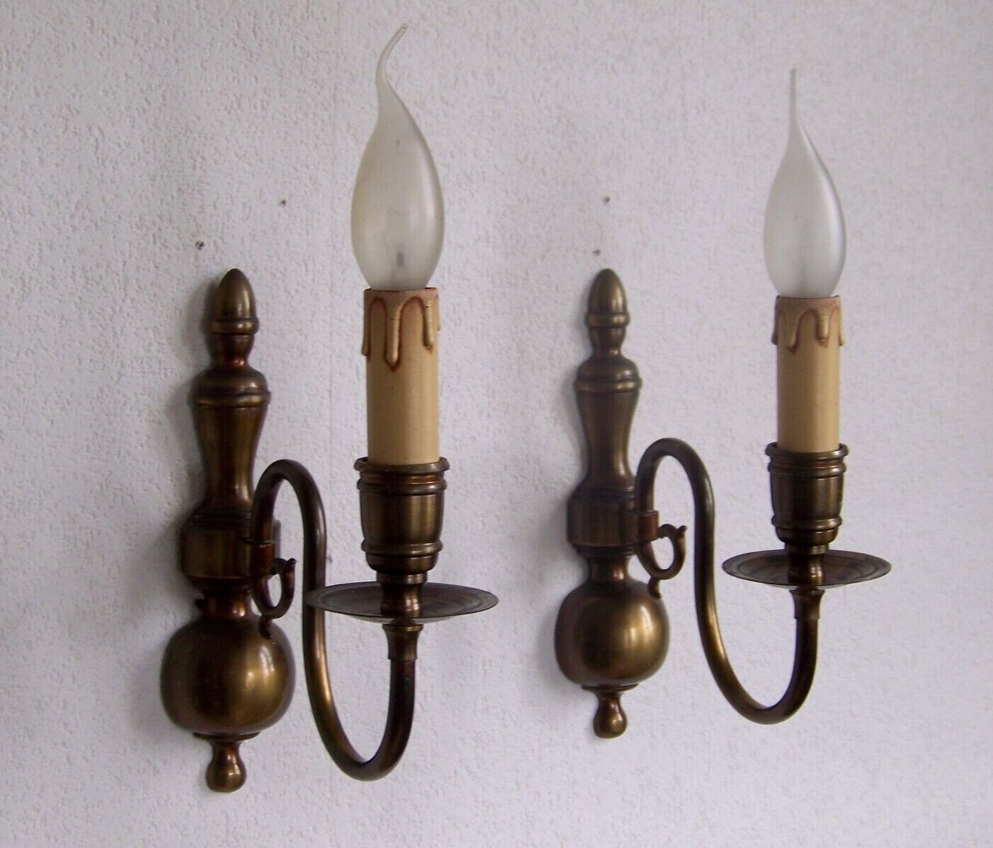 Pair of metal wall sconces