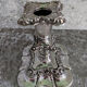 Pair of silver metal candle holders