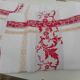 Nappe damassée bande rouge