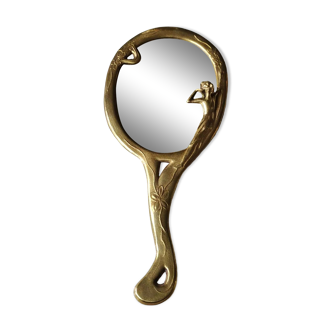Oval hand mirror in brass