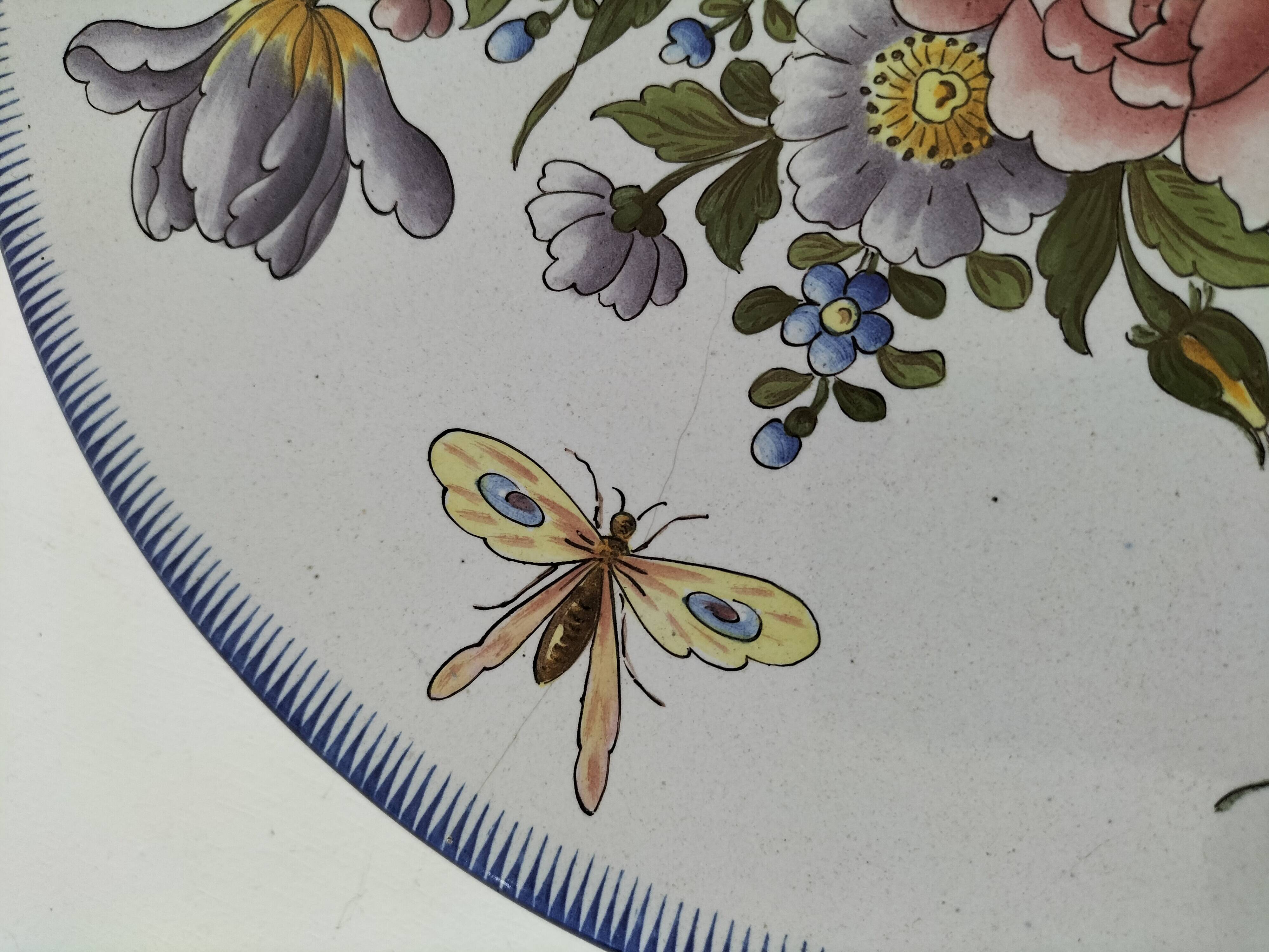 Decorative earthenware plate signed Charolles