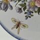Decorative earthenware plate signed Charolles