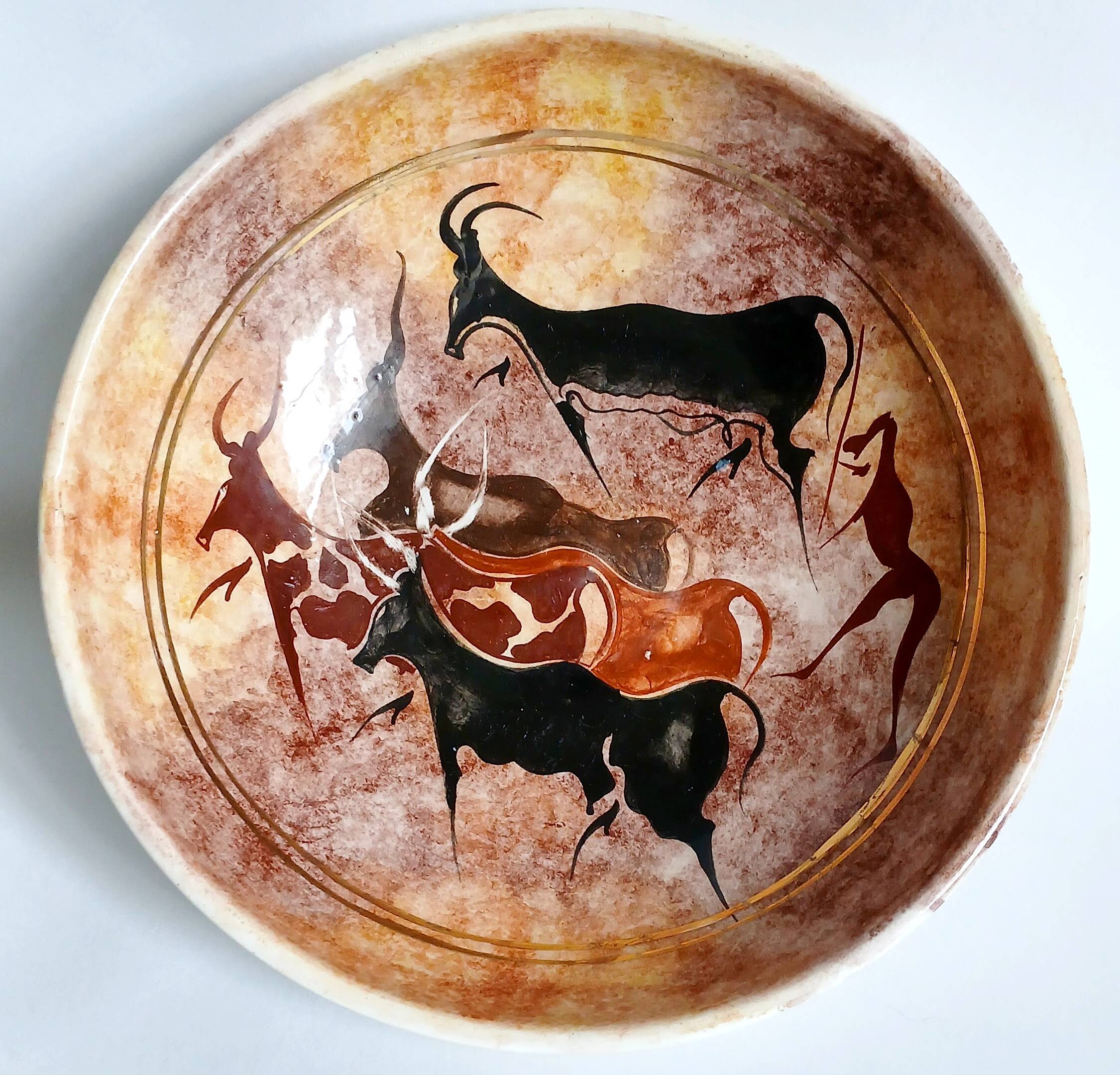 Ancient bowl inspired by parietal or rock art, hand-painted.