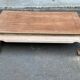 Decapitated opium coffee table in raw wood from the 90s.
