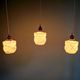 Art Deco trio of suspensions in opaline and marbled ouraline, Scailmont, 1920-30.