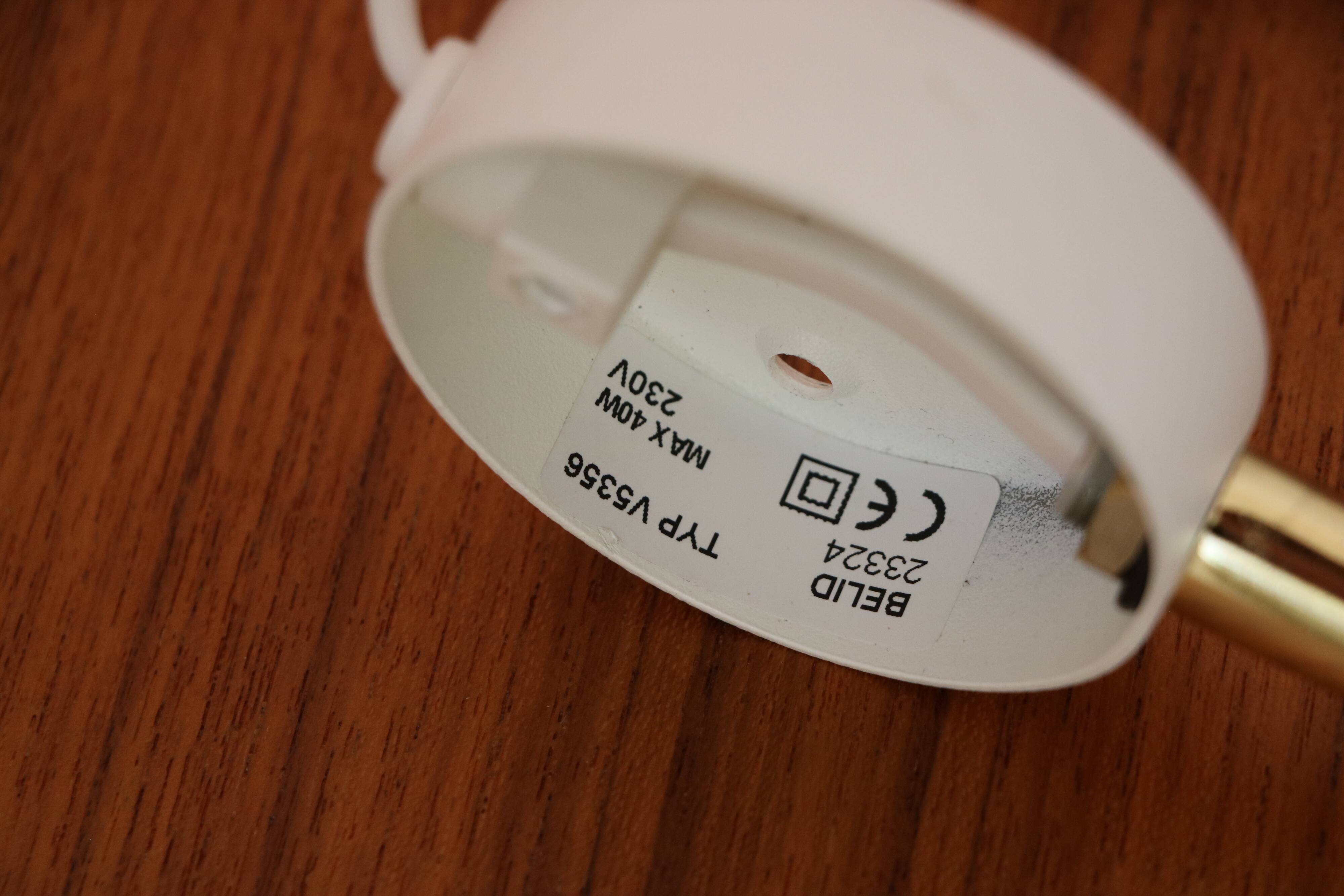 Pair of Scandinavian wall lights in white metal and gold metal