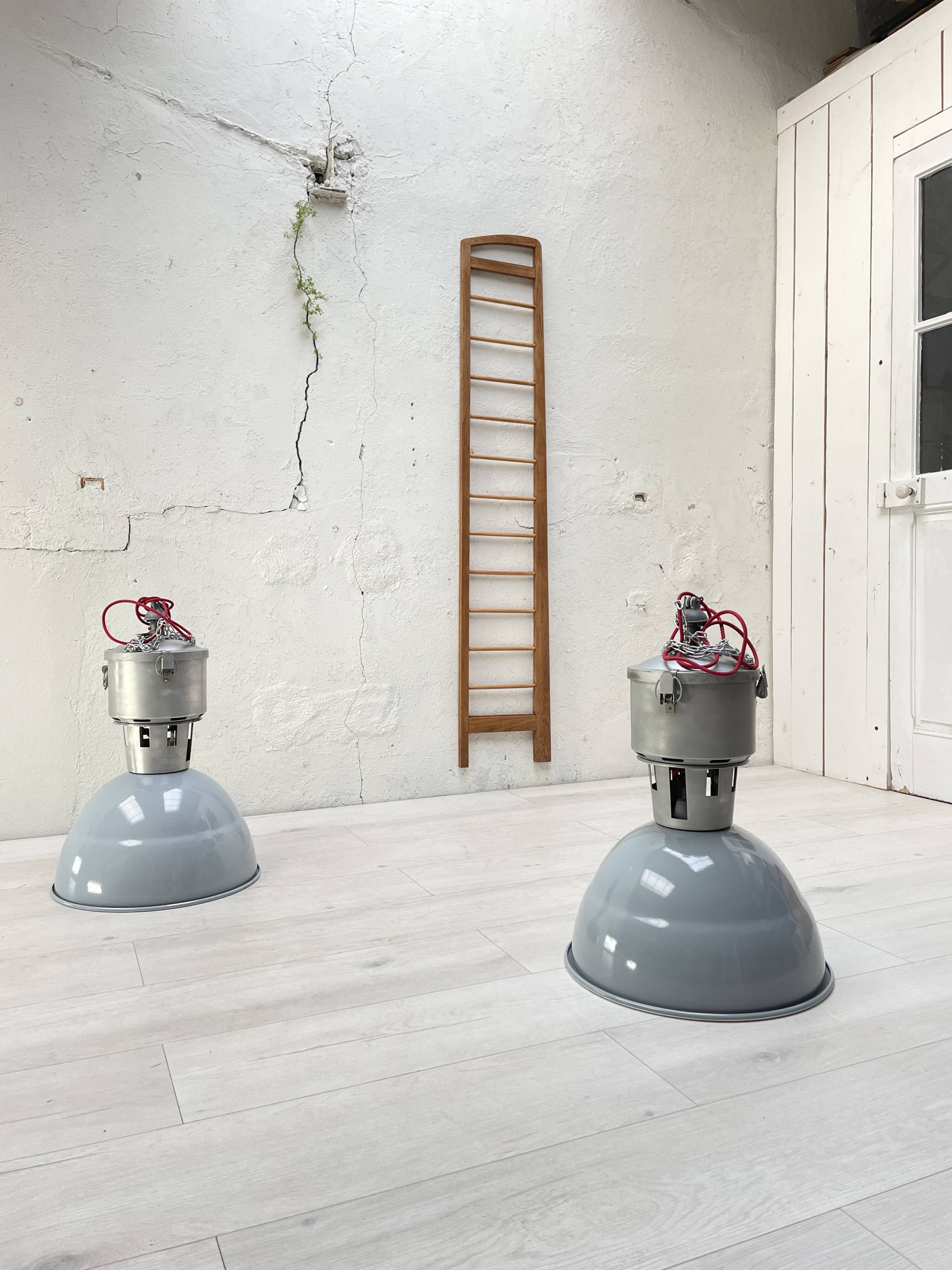 Pair of industrial lamps.